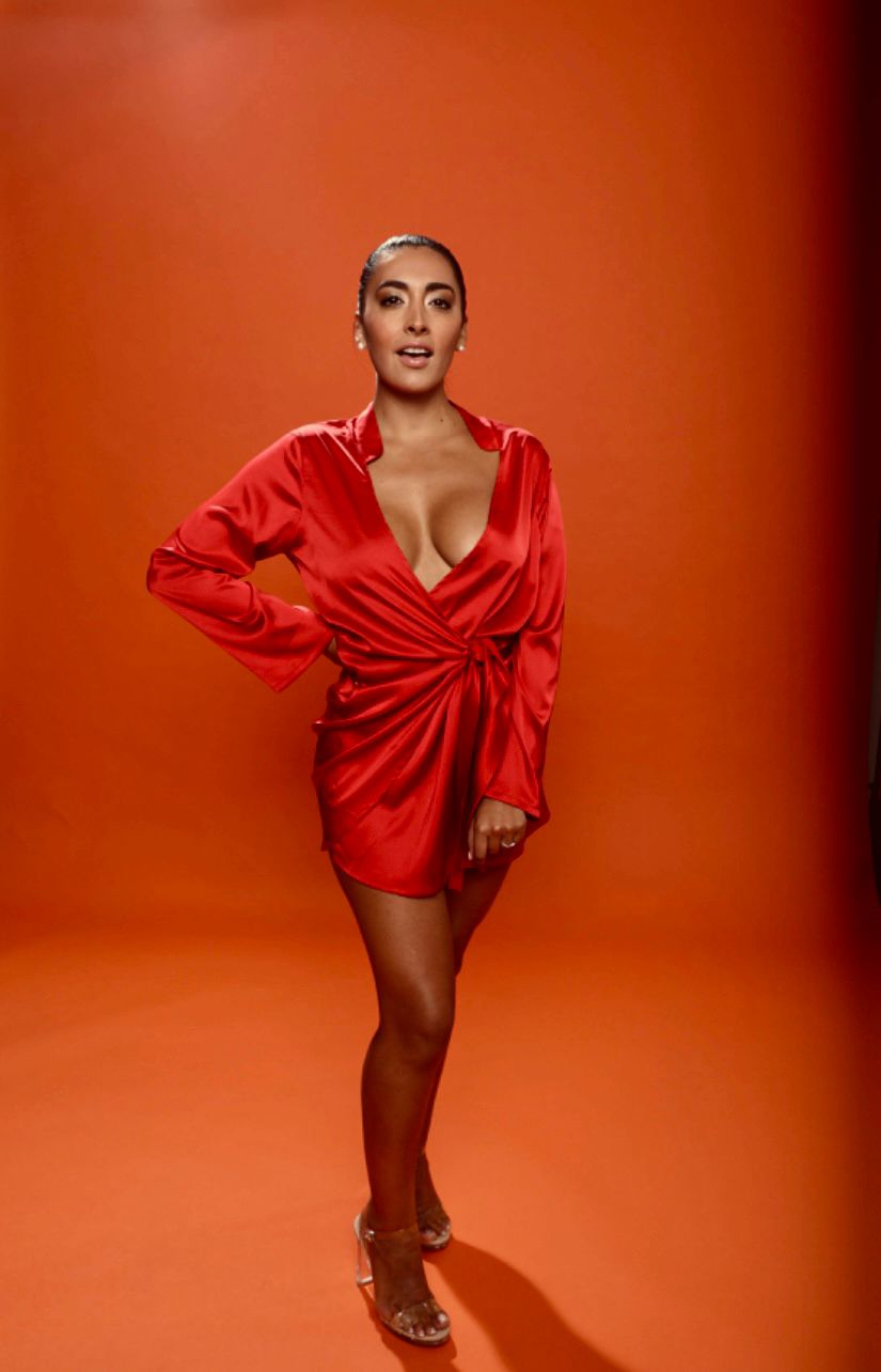 Crimson silk wrap dress — soft smile
